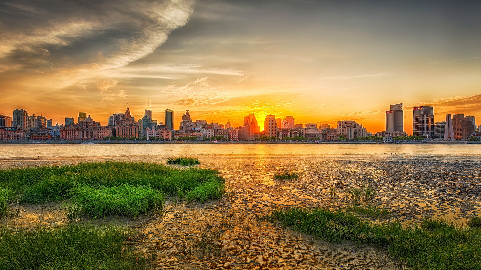 Shanghai skyline seen from the Bund at sunset